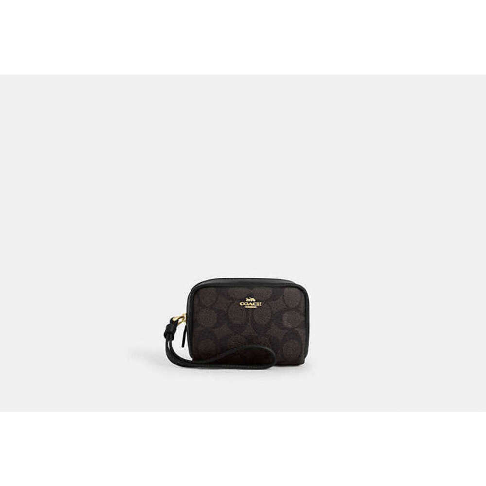 Pouch Wristlet In Signature Canvas